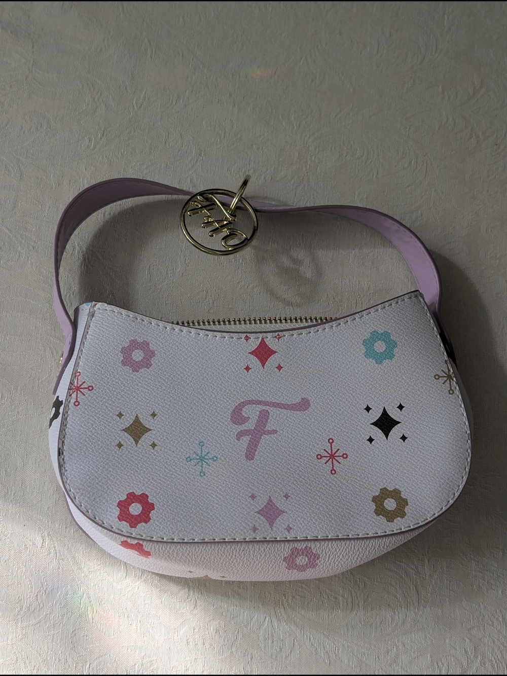 FAO Schwarz White Purple Multicolor Crescent Shoulder Bag Zip Gold Charm